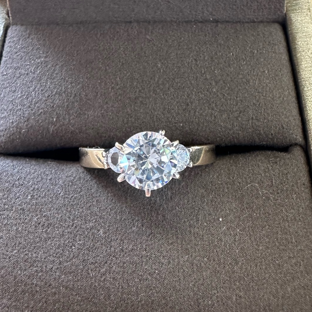 14 carat gold diamond ring photographed against white for a retailer product listing